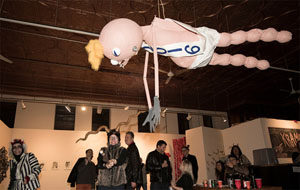 Catie Olson, piñata. Photo by Rob Karlic